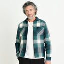 WAX LONDON Whiting Overshirt - Ombre GREEN
The Whiting Overshirts are created using a heavyweight fabric made sustainably by a family-run French mill using recycled cotton and are globally exclusive to Wax. The cotton threads are broken down as much as possible and then re-spun and dyed to create a rich blend of colours and patterns. 

Regular Fit
Traditional Collar
Front Patch Pocket
Corozo Nut Buttons
Signature Wax Silhouette
Fabric Originates From A Family-Run French Mill
Recycled Cotton

