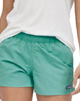 W's Barely Baggies 2 1/2" FRESH TEAL 
Updated for improved fit, the Barely Baggies™ Shorts have a higher rise and more comfortable leg openings. They have our P-6 logo at the left hem and are made of NetPlus® 100% postconsumer recycled nylon made from recycled fishing nets to help reduce ocean plastic pollution. Inseam is 2½”; regular rise. PATAGONIA